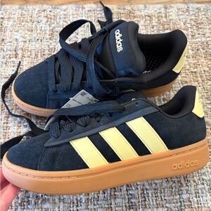 Adidas Black and Gold Sneakers
